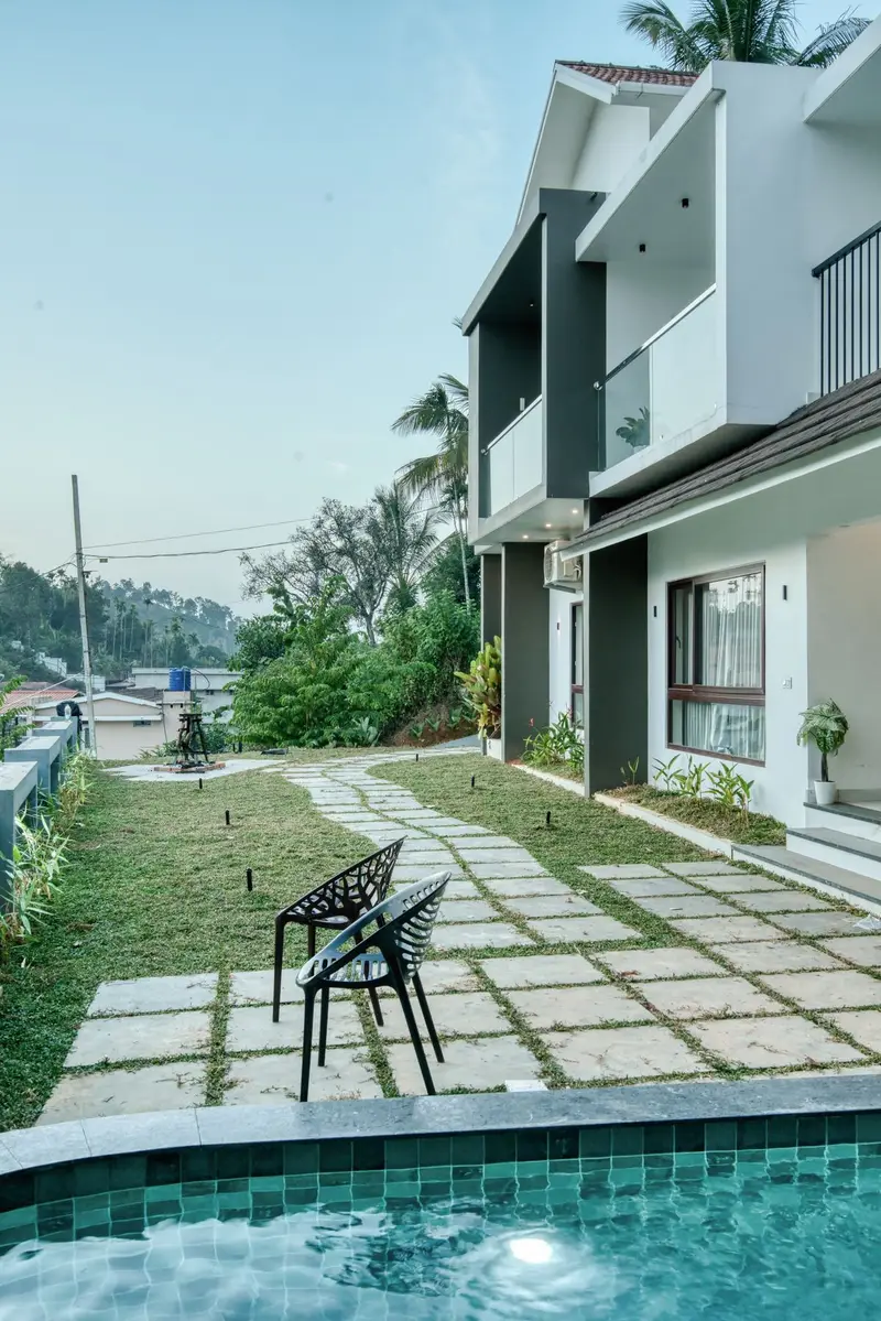 Stone path across the lawn to the pool