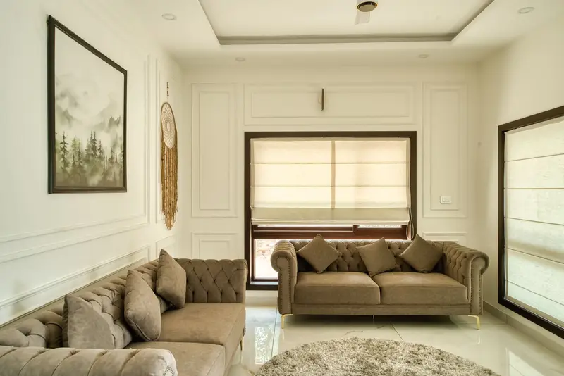 Sitting room with two beige sofas