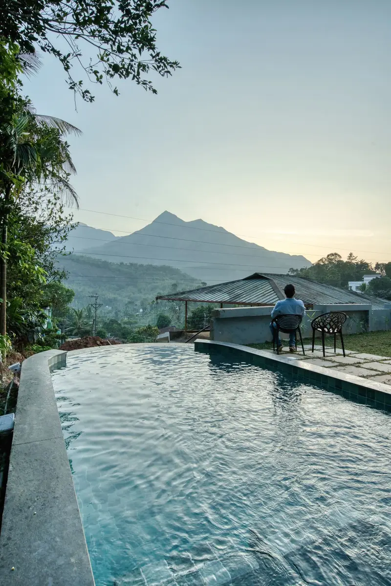 Pool edge with a view across to the mountains